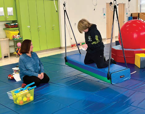 A variety of exercises help John Evans restore hand and finger function