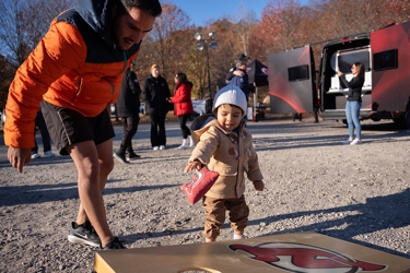 2024 RWJBarnabas Health’s Running with the Devils 5K Run & Walk Child Playing Cornhole