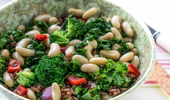 Sauteed greens and beans in a bowl