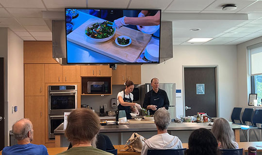 Dr. Granet doing a cooking demonstration at the Anne Vogel Family Care and Wellness Center