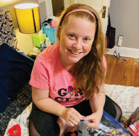 Ocean Township resident Alix Hayes has donated hundreds of homemade stretch headbands