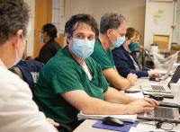 Matthew Schreiber, MD, Chief Operating Officer in the NBI Command Center, working alongside the crisis team