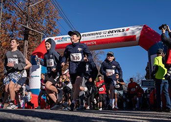 race start line with children running