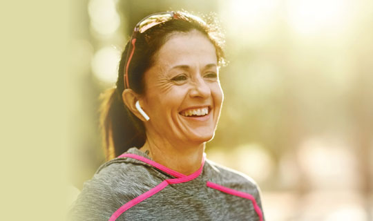 woman smiling and getting ready for a workout