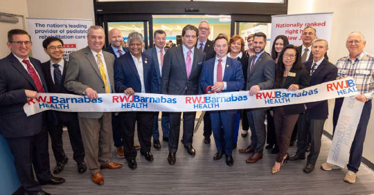 Leadership of RWJBarnabas Health, Children’s Specialized Hospital and The Bristol-Myers Squibb Children’s Hospital at Robert Wood Johnson University Hospital gather at the East Brunswick facility’s ribbon-cutting ceremony