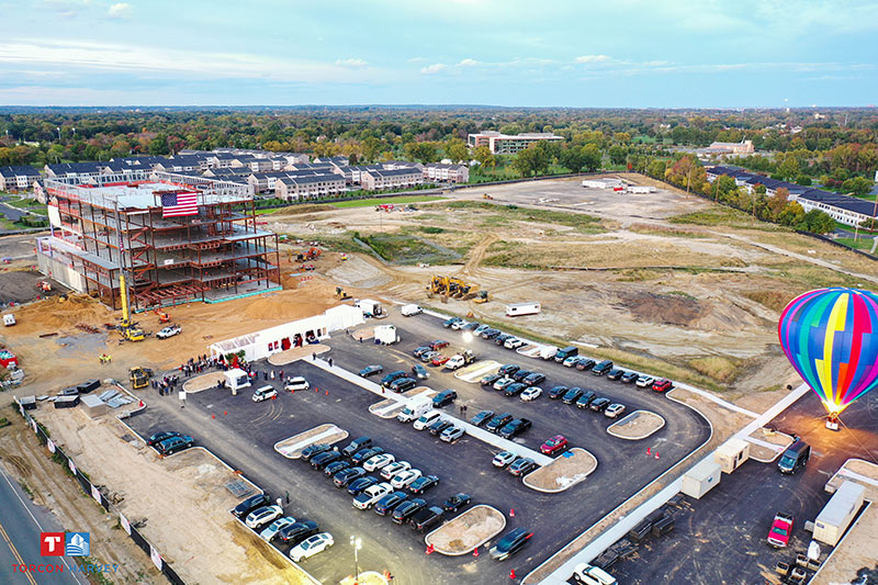 An aerial view of the 44-acre Vogel Medical Campus, showing the LINAC concrete on the ground floor and the 5-story steel framework.