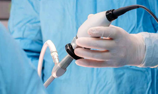 surgeon performing unilateral biportal endoscopy